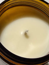 Load image into Gallery viewer, Close up of wick and wax on Sconnie Candle Co. candle. 