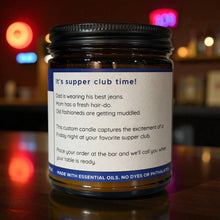 Load image into Gallery viewer, Supper Club soy candle on bar. 