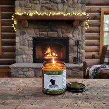 Load image into Gallery viewer, Up North soybcandle with scents of fresh air, fir and wisps of campfire smoke in cabin. 